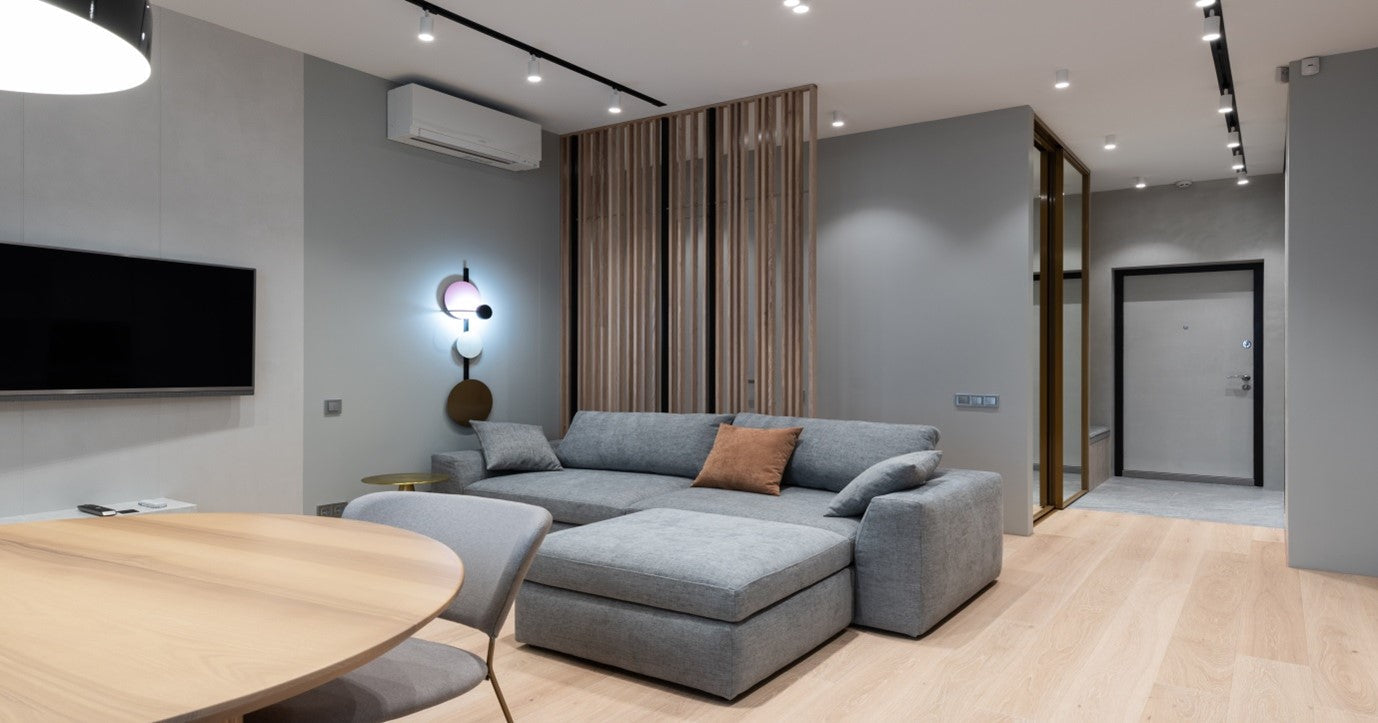 Modern living room with wall-mounted split air conditioning unit