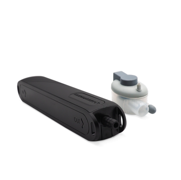 The Sauermann Si-20 Mini Condensate Pump has a detection unit, black pump body, and transparent reservoir against a black background.