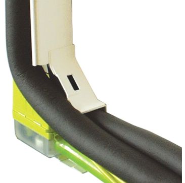 Aspen Maxi Lime Condensate Pump FP2213 installed on an air conditioning system. The compact pump, with its green and transparent reservoir, is clipped onto a yellow mounting bracket. Black insulated pipes are connected to the pump, and a white elbow fitti