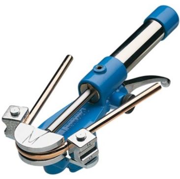 A JAVAC HB85 Hydraulic Tube Bender with a blue and silver body, bending a soft copper tube. The tool features a double hydraulic circuit, adjustable pump lever, and a bending former, designed for air conditioning and refrigeration applications.