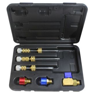 Mastercool Universal R1234yf Master Kit. A black plastic carrying case open to reveal an organized tool kit. The case contains five tools with brass and metal components, including four elongated tools with knurled handles in silver and gold tones, and on