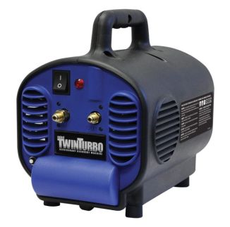 A blue and black Mastercool Mini TwinTurbo Refrigerant Recovery Machine with a top handle, featuring two brass valve connections labelled "IN" and "OUT," a power switch, a red indicator light, and ventilation slats on the sides.