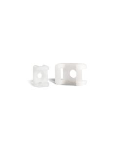 Two Partex SM3-NAT Saddle Mounts in natural colour, made of Nylon 6.6, shown from different angles against a white background. Each mount features a central hole for an M5 screw and a slot for securing cable ties up to 9mm wide.