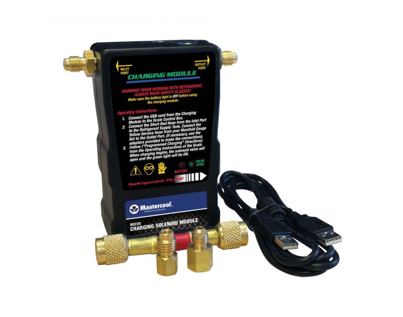 A Mastercool 98230 Charging Solenoid Module is shown with its accessories. The black module has labelled inlet and outlet ports, a USB cord, and two brass adapters with a short red hose. Warning labels and operating instructions are printed on the module, A Mastercool 98230 Charging Solenoid Module is shown with its accessories. The black module has labelled inlet and outlet ports, a USB cord, and two brass adapters with a short red hose. Warning labels and operating instructions are printed on the module,