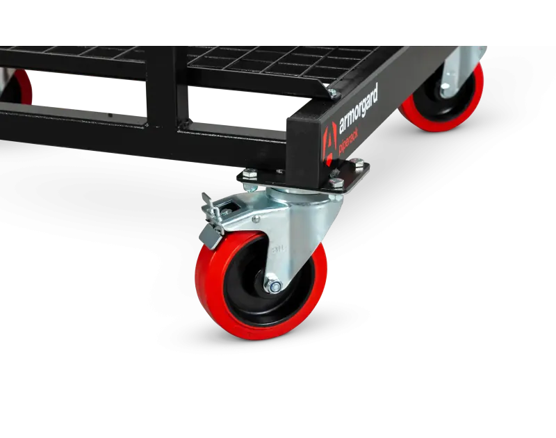 Close-up of Armorgard PipeRack corner, featuring a red castor wheel and the Armorgard PipeRack logo on a black steel frame, designed for mobile pipe storage on construction sites.