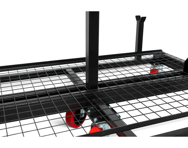 Close-up of Armorgard PipeRack base, featuring a black steel mesh platform and red castor wheels for easy mobility, designed for secure pipe storage on construction sites.
