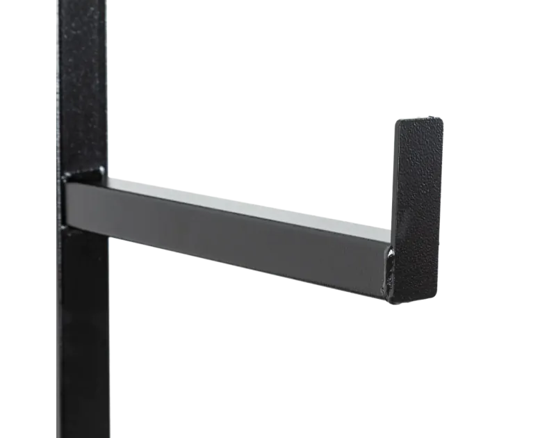 Close-up of Armorgard PipeRack arm, showing a sturdy black steel construction with a protective end cap, designed for secure pipe and conduit storage on construction sites.