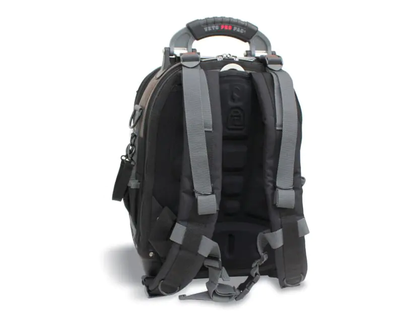 Rear view of a black Veto Pro Pac Tech Pac tool backpack, showcasing its ergonomic design with adjustable padded shoulder straps and EVA thermoformed back padding for comfort. The bag features a sturdy handle, side pockets, and D-rings for additional atta