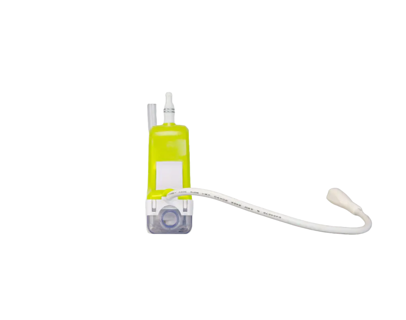Silent+ Mini Lime Condensate Pump by Aspen Pumps, featuring a green and white elbow design with attached tubing, displayed on a white background.