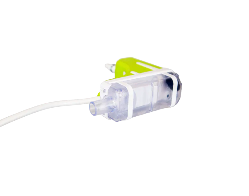 Silent+ Mini Lime Condensate Pump by Aspen Pumps, featuring a green and white elbow design with attached tubing, displayed on a black background, viewed from the left side.