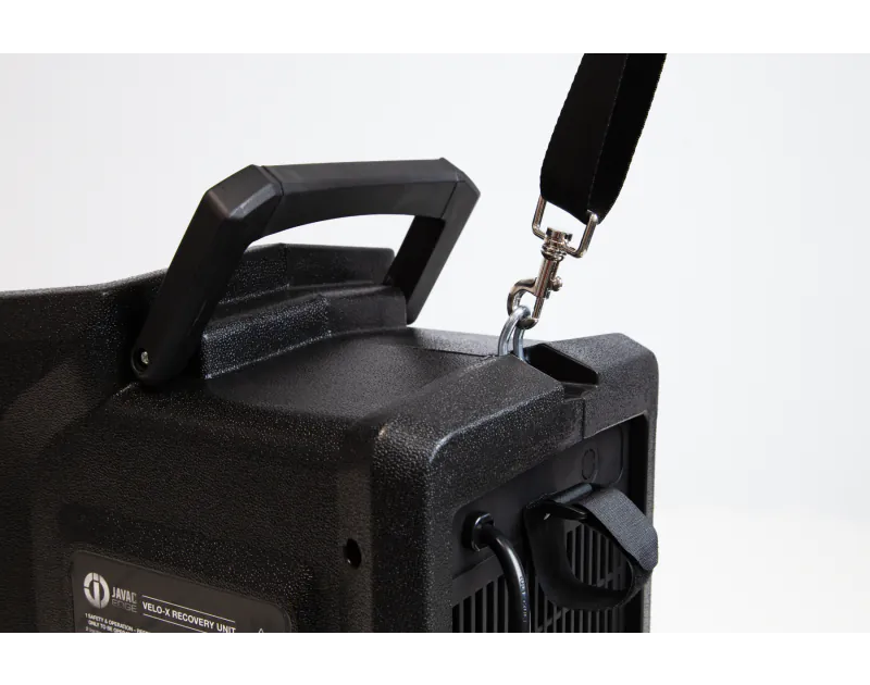 Velo-X Recovery Unit: Portable design with integrated carrying handle and shoulder strap for easy transport
