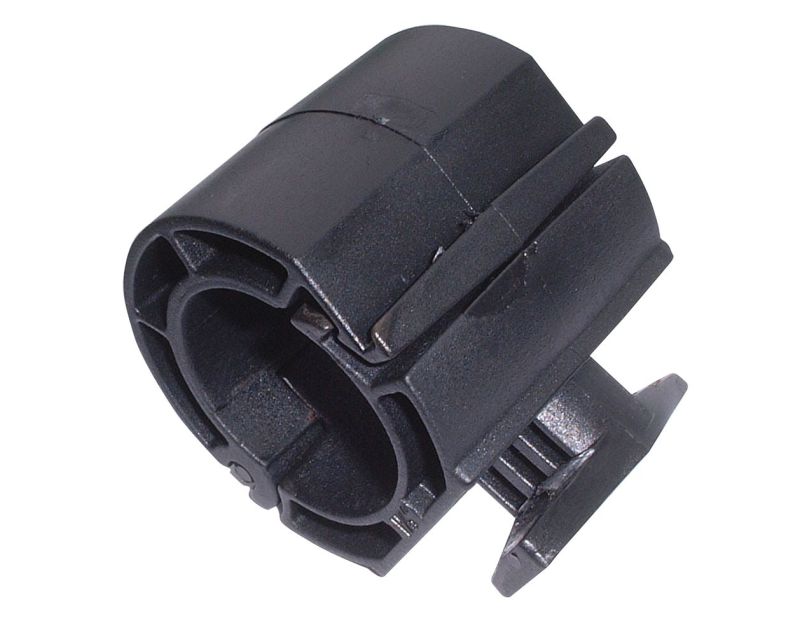 Black nylon Quick Positioning Clip for air conditioning and refrigeration pipe support, shown in close-up view with cylindrical body, split design for 9mm insulated pipes, and twist-lock tabs for securing into unistrut-style channel