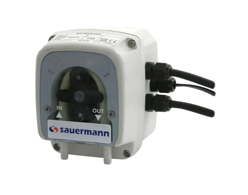 This is a white Sauermann PE-5100 peristaltic condensate pump with a transparent front panel that displays the internal roller mechanism. The pump features two black cables on the right side, labelled "IN" and "OUT" ports for suction and discharge, and th This is a white Sauermann PE-5100 peristaltic condensate pump with a transparent front panel that displays the internal roller mechanism. The pump features two black cables on the right side, labelled "IN" and "OUT" ports for suction and discharge, and th